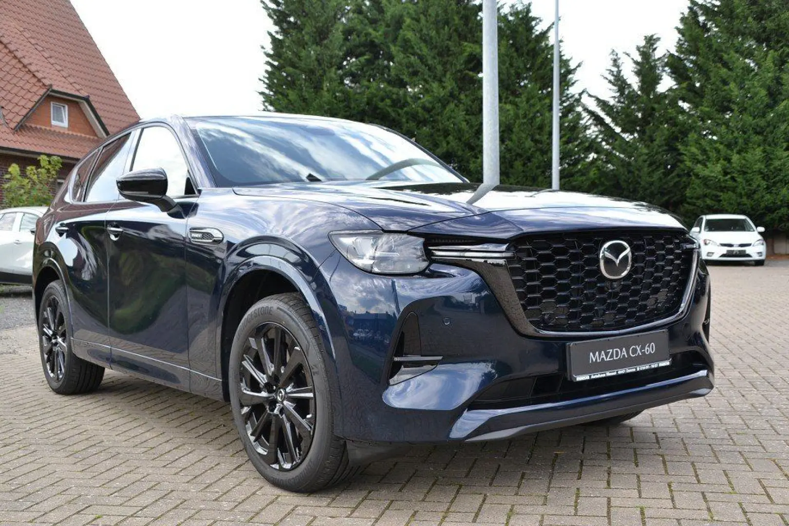 CX-60 2.5 e-Skyactiv PHEV HOMURA CON-P DRI-P COM