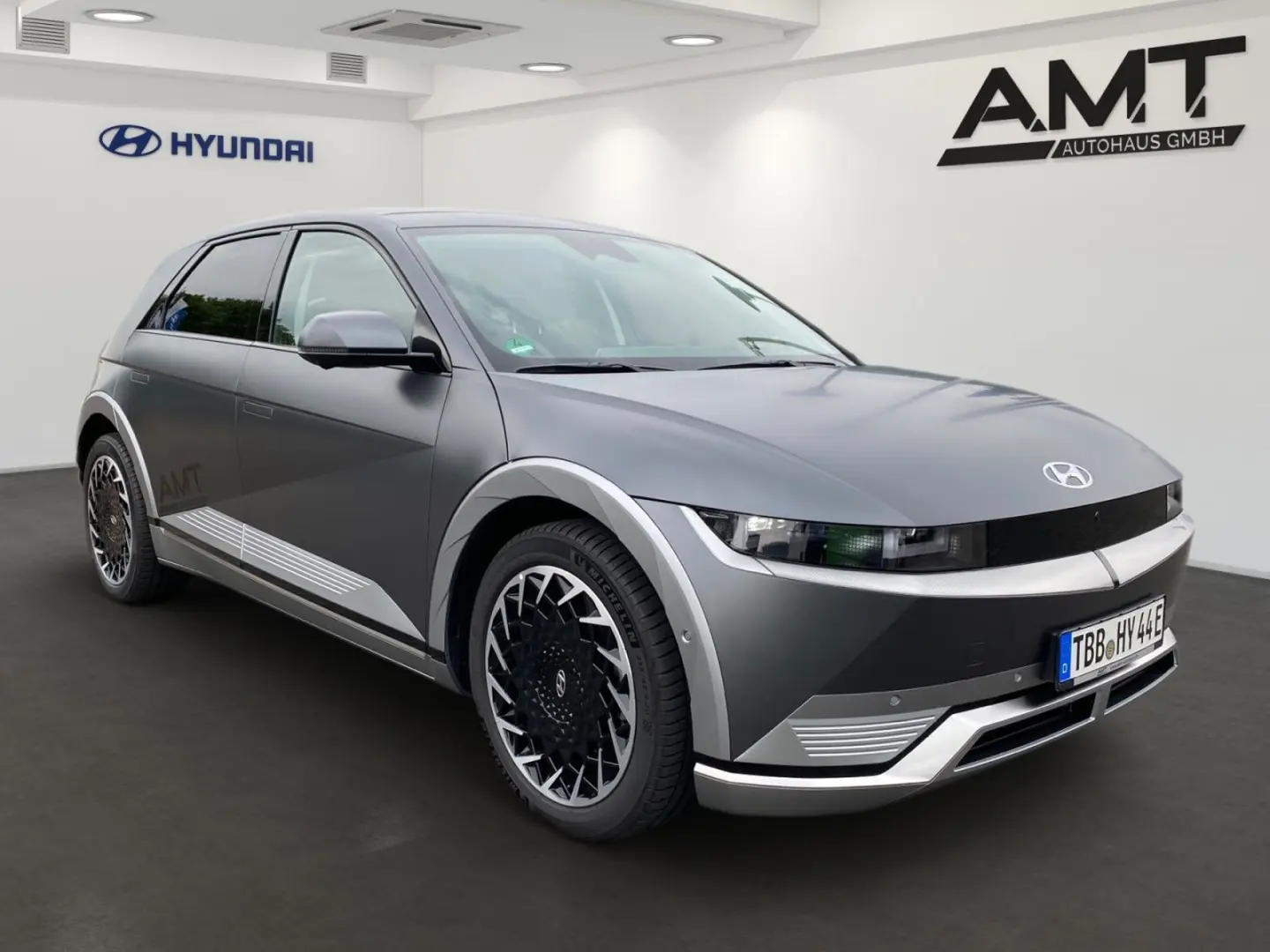 IONIQ 5 Uniq 77,4 kWh+4WD Sitzpaket+Pano+Assist.