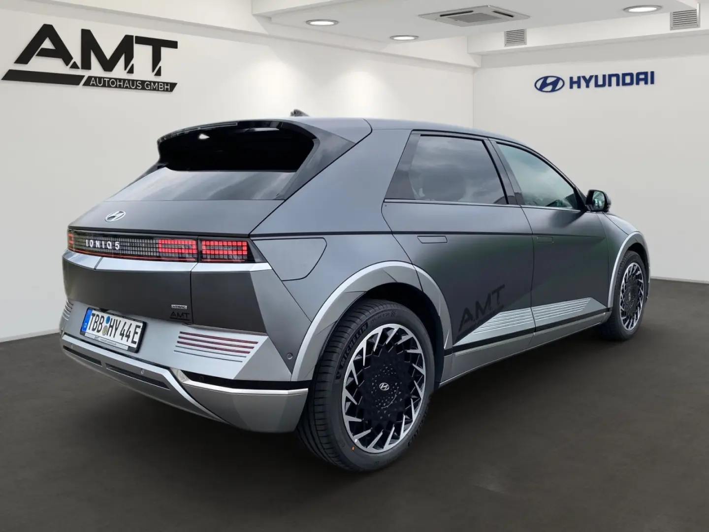 IONIQ 5 Uniq 77,4 kWh+4WD Sitzpaket+Pano+Assist.