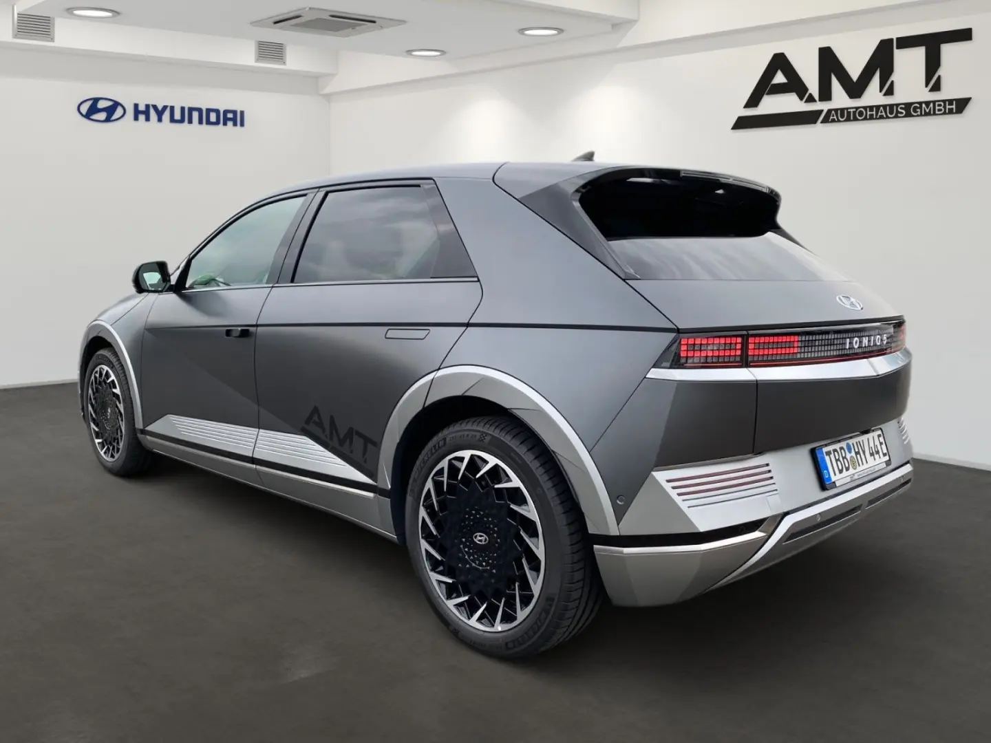 IONIQ 5 Uniq 77,4 kWh+4WD Sitzpaket+Pano+Assist.