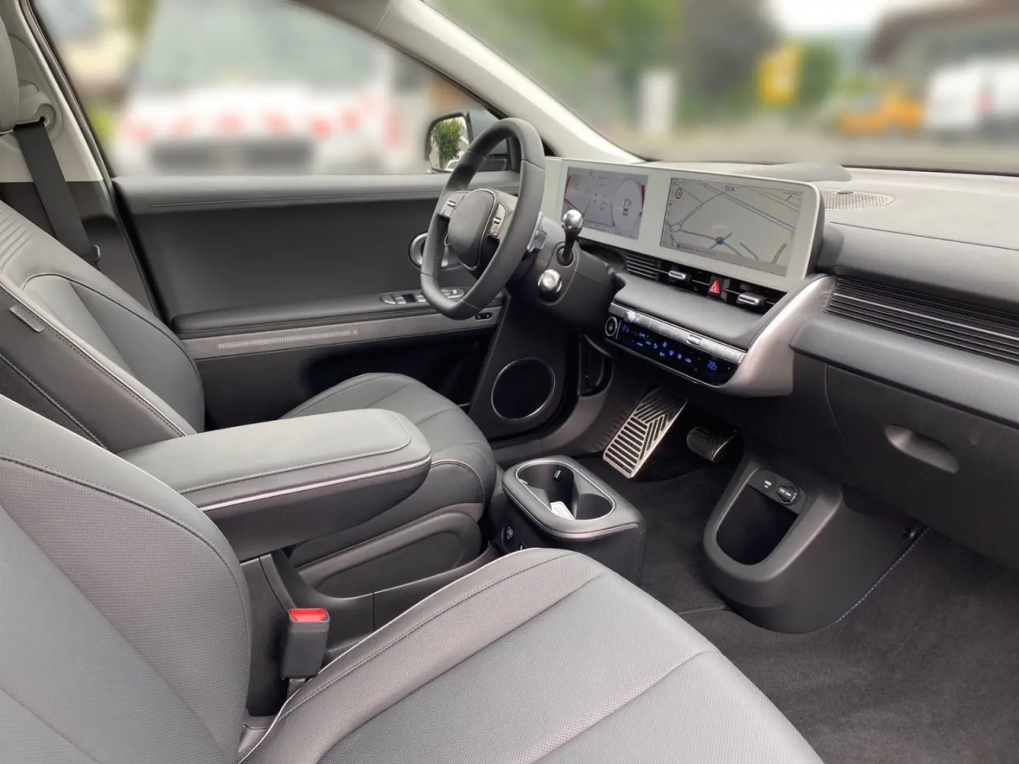 IONIQ 5 Uniq 77,4 kWh+4WD Sitzpaket+Pano+Assist.