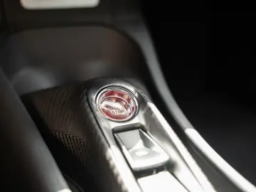 Artura Coupé   Vermillon Red   Carbon Interior