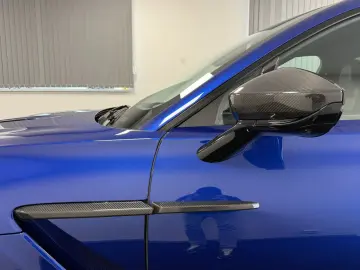 DBX 707   Ion Blue Signature Metallic   Carbon