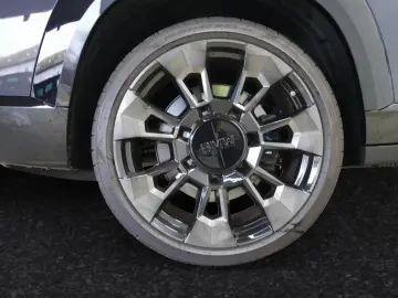 BMW XM 50e  Sepia met.  AHK 23 LMR