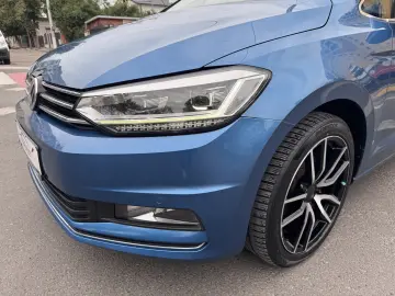 VW Touran   2016  cutie automată  7 Locuri