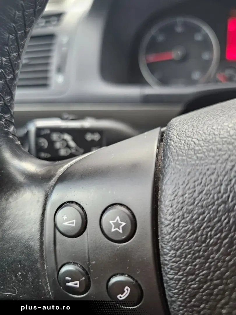 Vw Touran 1.9 tdi model United cu 7 locuri