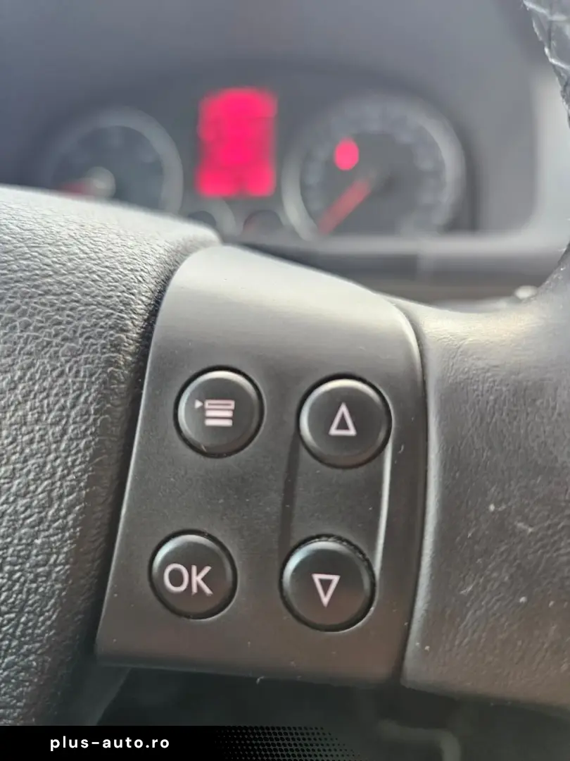 Vw Touran 1.9 tdi model United cu 7 locuri