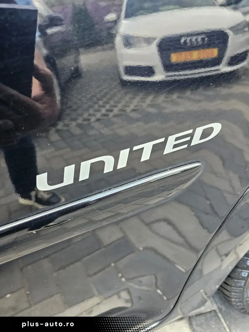 Vw Touran 1.9 tdi model United cu 7 locuri