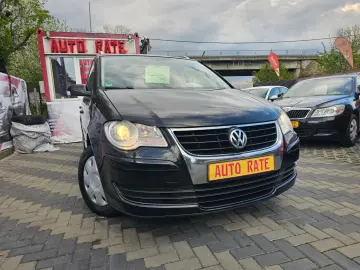 Vw Touran 1.9 tdi model United cu 7 locuri