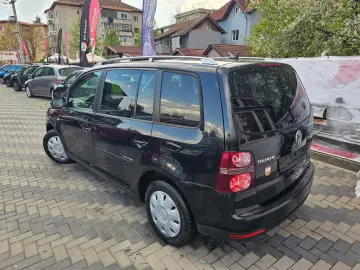 Vw Touran 1.9 tdi model United cu 7 locuri