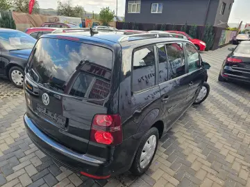 Vw Touran 1.9 tdi model United cu 7 locuri