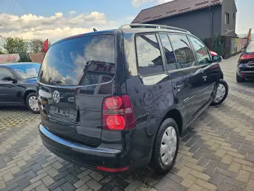 Vw Touran 1.9 tdi model United cu 7 locuri