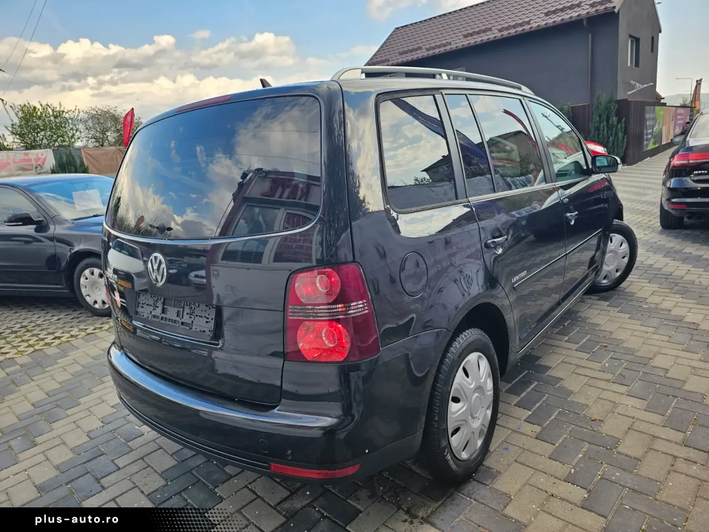 Vw Touran 1.9 tdi model United cu 7 locuri