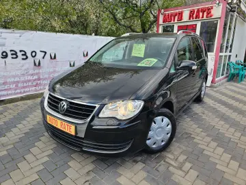 Vw Touran 1.9 tdi model United cu 7 locuri