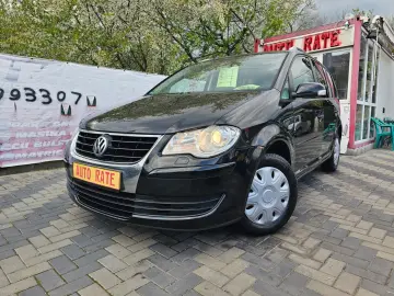 Vw Touran 1.9 tdi model United cu 7 locuri