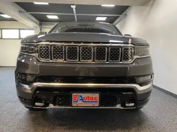 JEEP GRAND WAGONEER 6.4L V-8 LPG  NIGHT VIEW 1. HAND