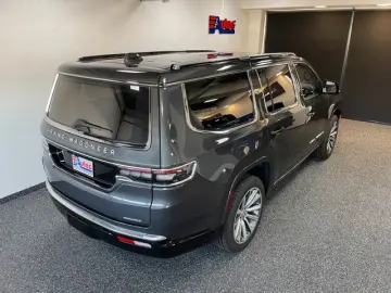 JEEP GRAND WAGONEER 6.4L V-8 LPG  NIGHT VIEW 1. HAND