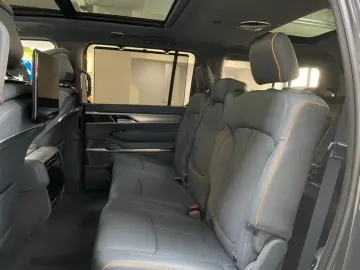 JEEP GRAND WAGONEER 6.4L V-8 LPG  NIGHT VIEW 1. HAND