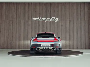 PORSCHE 992 Dakar  Martini Design  1. Hand  Burmester