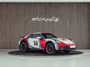 PORSCHE 992 Dakar  Martini Design  1. Hand  Burmester