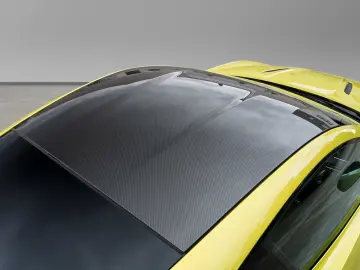 ASTON MARTIN Vantage Cosmopolitan Yellow   Onyx Black Carbon