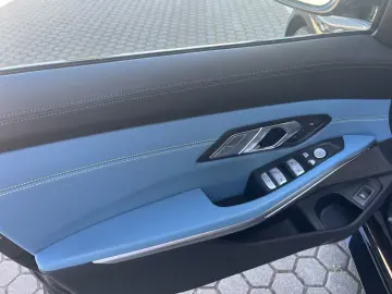 BMW M3 Competition Touring xDrive Blue Interior