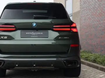 BMW X5 xDrive50e M Sport Pro   Sky Lounge • Masaj